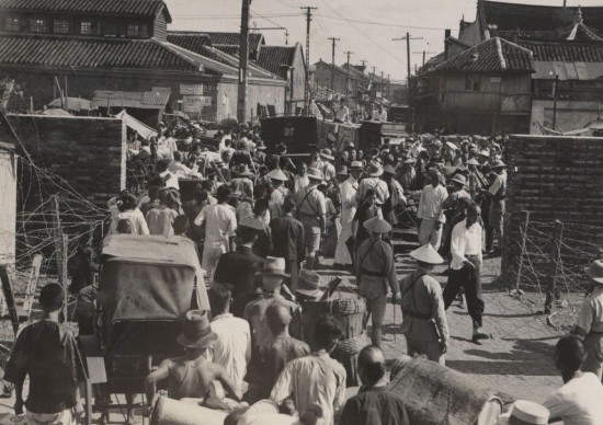 Refugees fleeing from Chinese Quarter into the French Concession